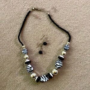 Zebra beaded necklace with matching earrings.